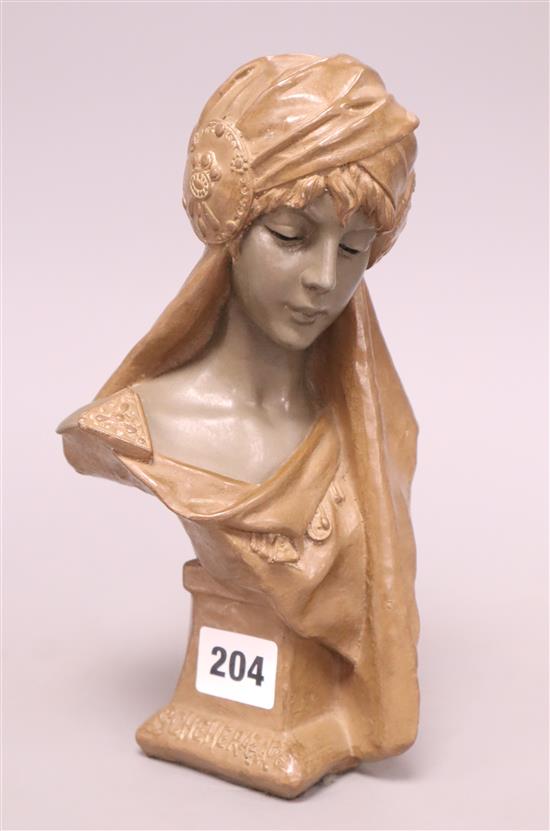 A resin bust of Scheherazade, signed F. Villanis, height 23cm